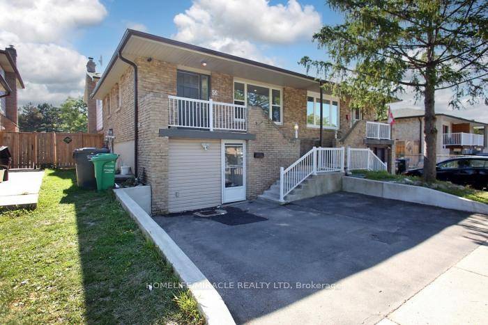 This is a semi detached split bungalow with a walk out basement apartment.