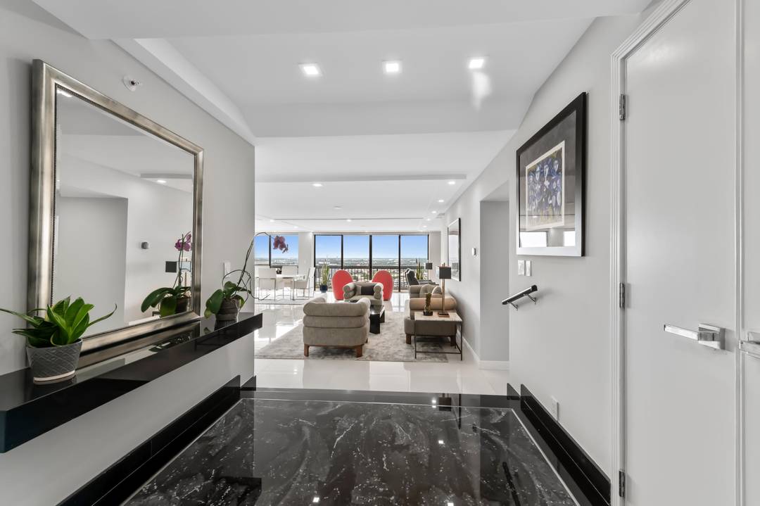 The epitome of elegance in the heart of WPB offering the grandeur of inside outside living with a 640 sq.