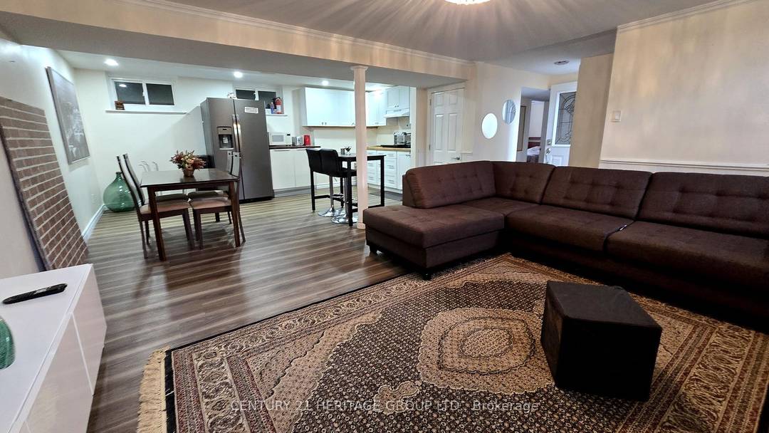 Welcome to this stylish raised bungalow showcasing a bright and functional layout.