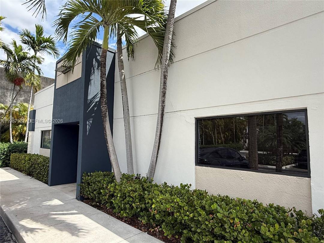 Exceptional end cap unit featuring a welcoming reception area connected to conference room, 6 private offices, large open office floor plan, an employee lounge, supplies room, and warehouse area with ...