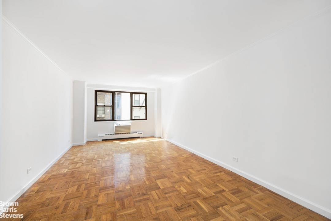 Welcome to Apartment 5J at 230 East 15th Street, a sunlit, south facing quiet studio offering tasteful updates, generous storage, and a flexible layout in the historic Gramercy Park neighborhood.