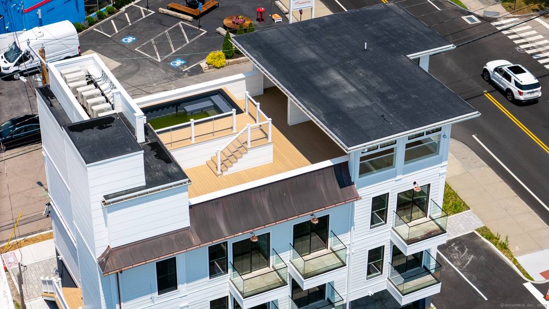 This property offers an incredible opportunity to own a small boutique hotel with with upscale rooftop amenities and offering great views of Mystic all while enjoying the rooftop dip pool, ...