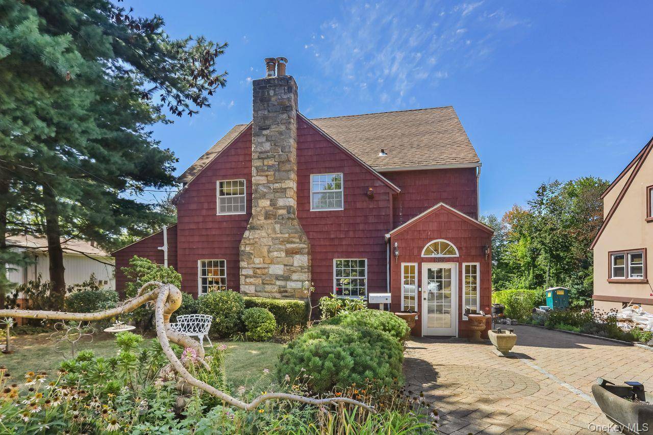 Experience timeless elegance in this classic Pelham colonial.