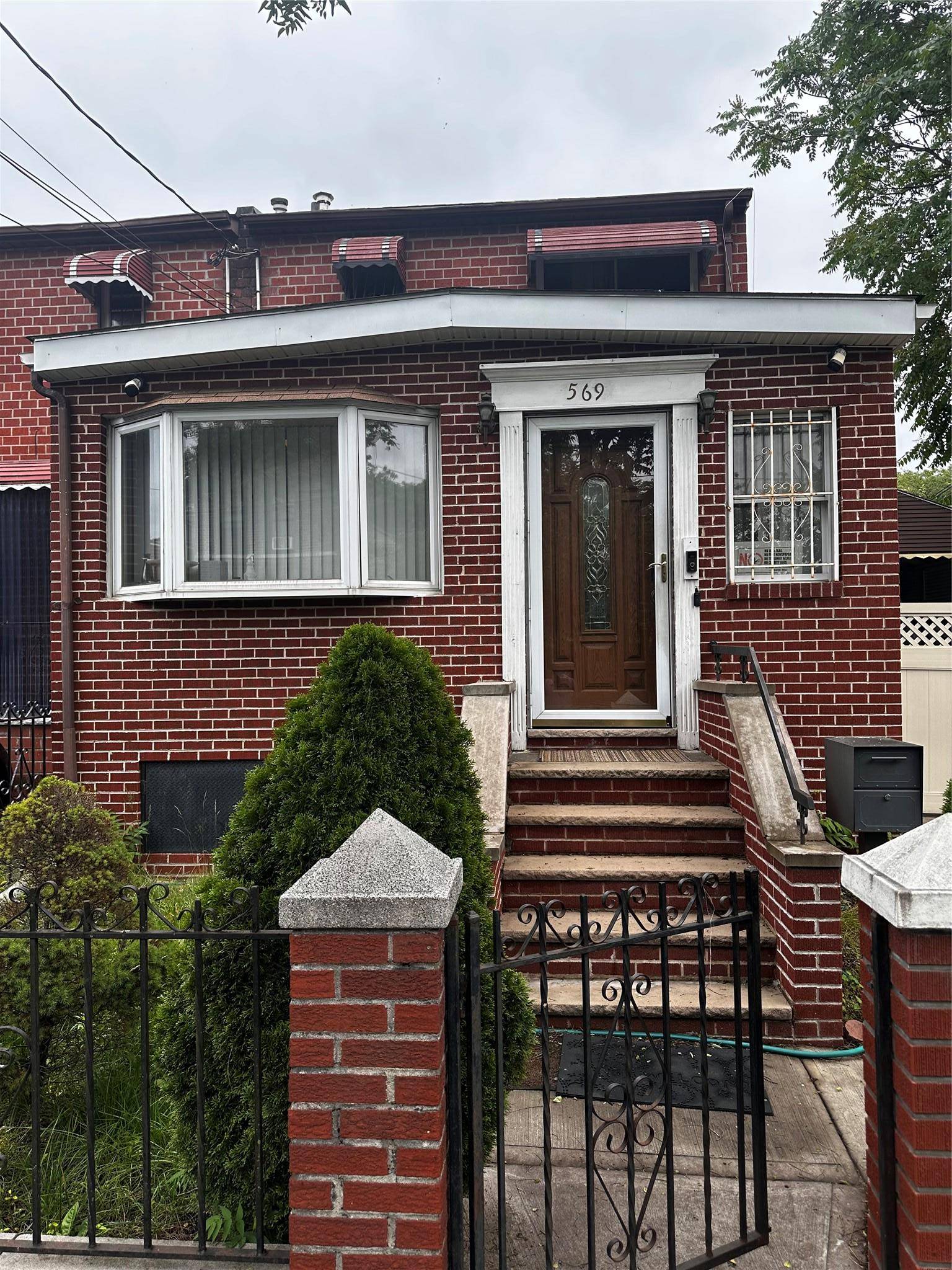 Welcome to this solid brick single family home featuring 3 bedrooms and 2.