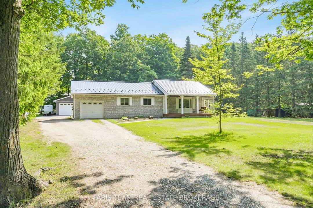 Top 5 Reasons You Will Love This Home 1 This ranch bungalow showcases attractive curb appeal and sits on over half an acre, combining peaceful rural living with quick access ...