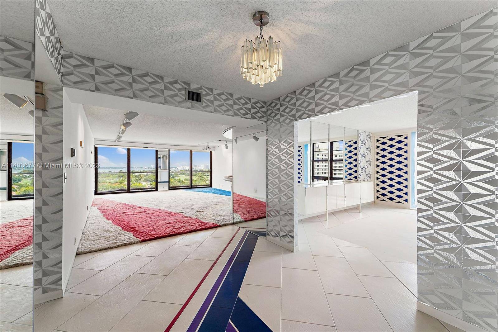 Nestled in the heart of Millionaire's row, uncover the exquisite Towerhouse Condo located at 5500 Collins Ave.