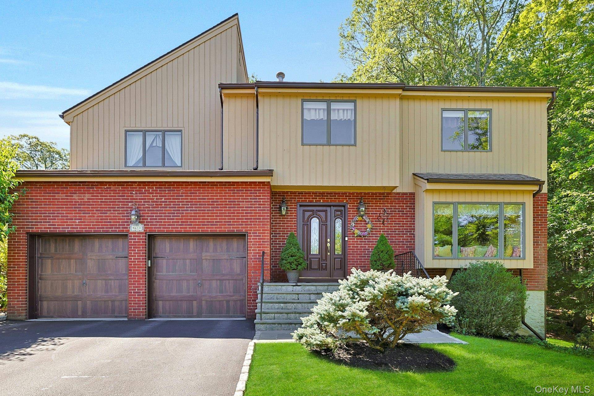 This custom built Contemporary Colonial offers the best of modern luxury, elegant amenities with attention to detail all in this private park like setting at the end of a cul ...