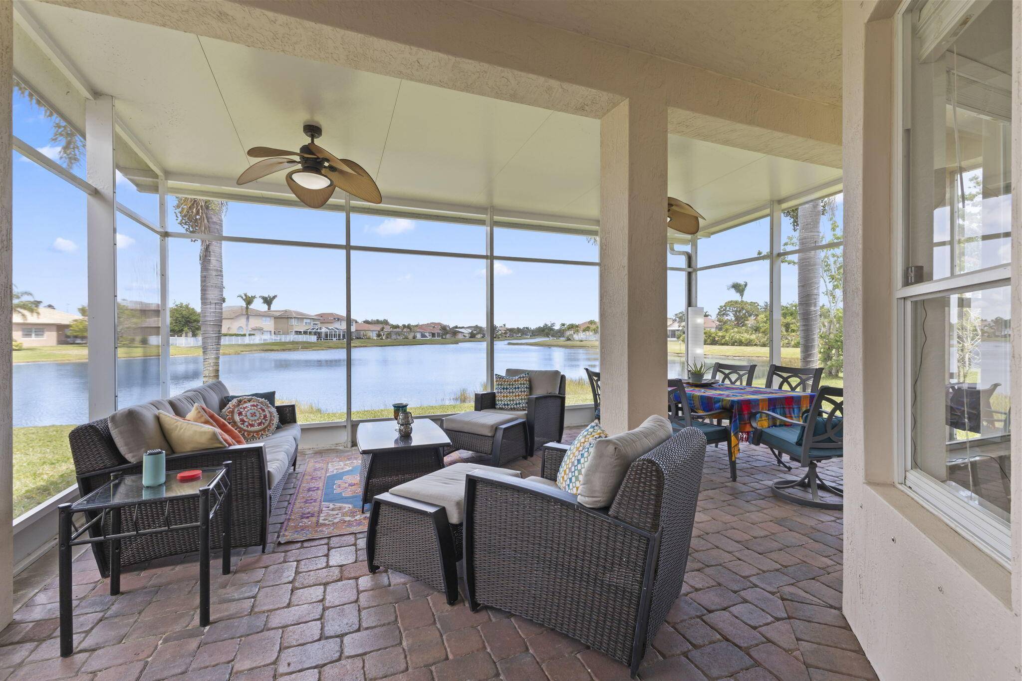 Impressive waterfront home on oversized lot located in sought after Portofino Shores community !