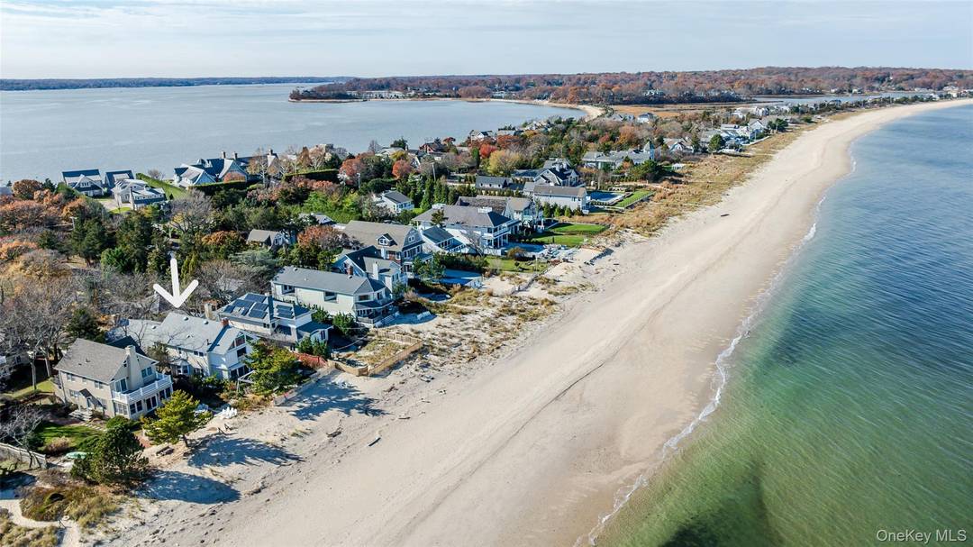 Embrace the toes in the sand lifestyle with this stunning custom designed 3 bedroom Colonial, perfectly situated on the shores of Long Island Sound.