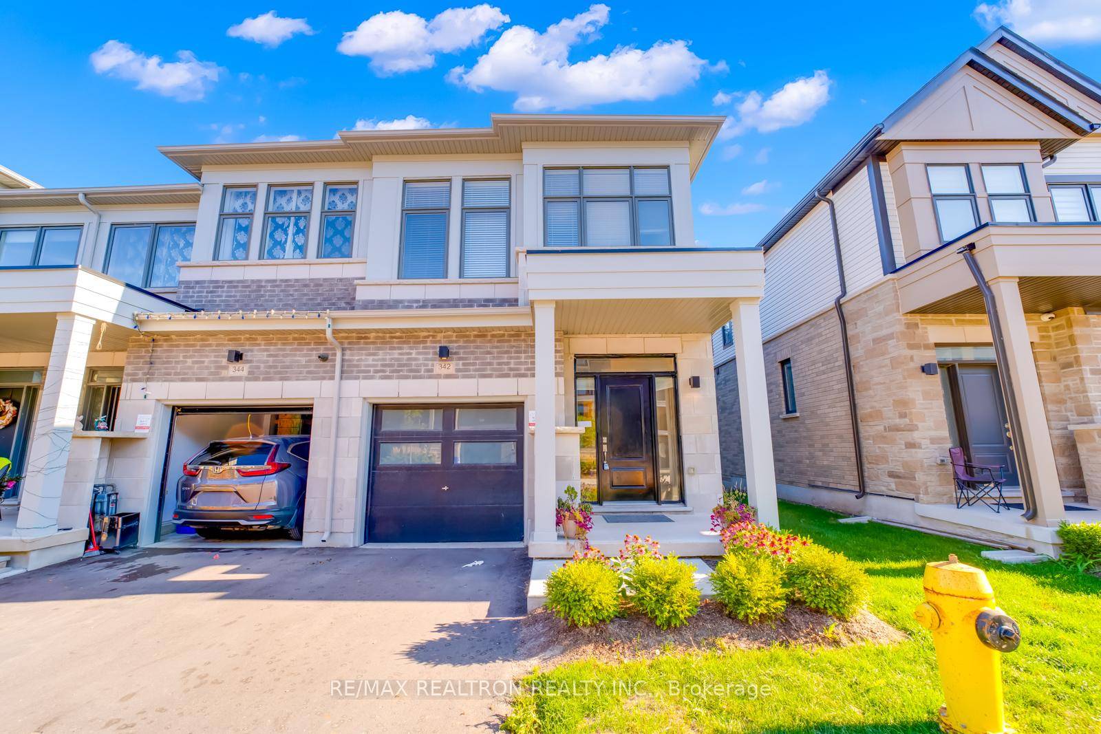 This stunning two story brick end unit townhome is located in one of Oshawa's most sought after modern communities.
