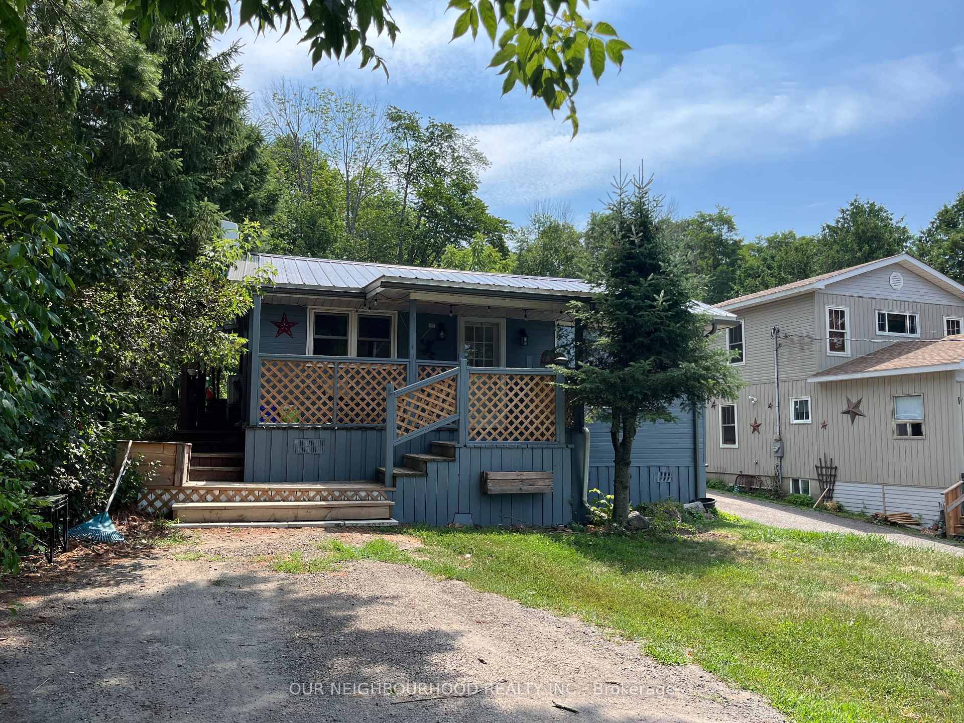 Sitting on a back lot to Crowe Lake this home is larger than it appears with 4 generous sized bedrooms, a 4 pc bath and 2 pc Ensuite.