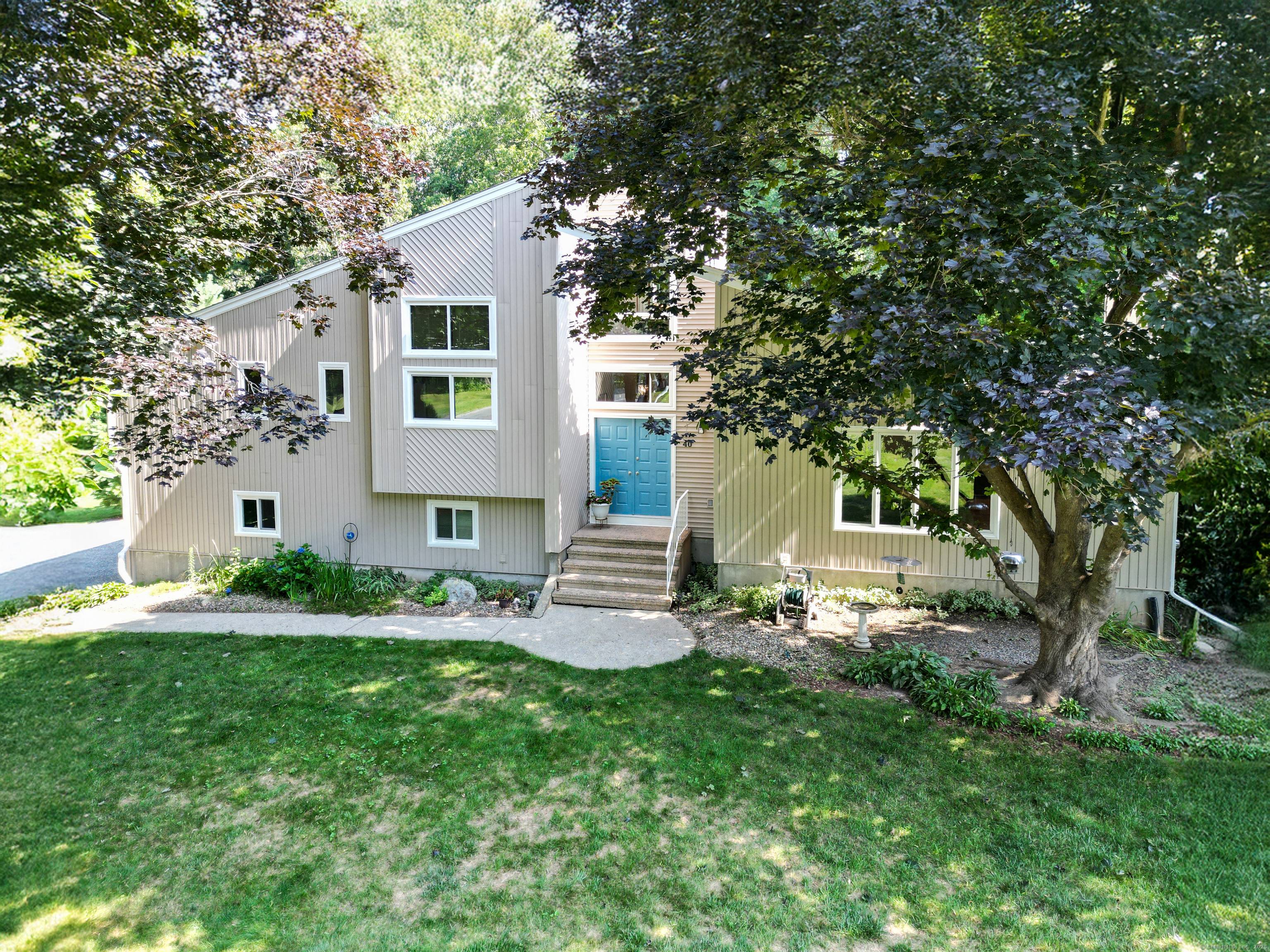 Beautifully Maintained Contemporary Design Home Located in Joshua Farms Subdivision On A Private Yet Neighborly 1.