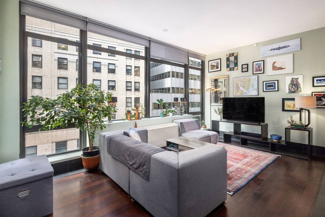 Come see this A line apartment featuring 10 ft ceilings with floor to ceiling windows.