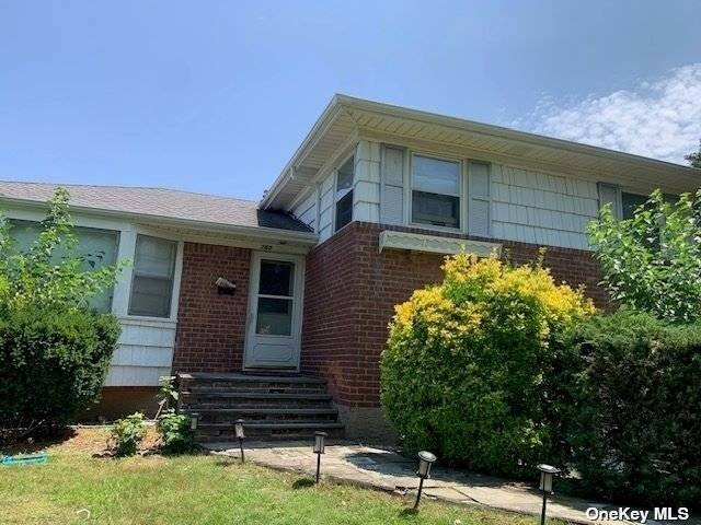 Large Split level home, walking distance to Hicksville LIRR station, Private beautiful Huge back yard.