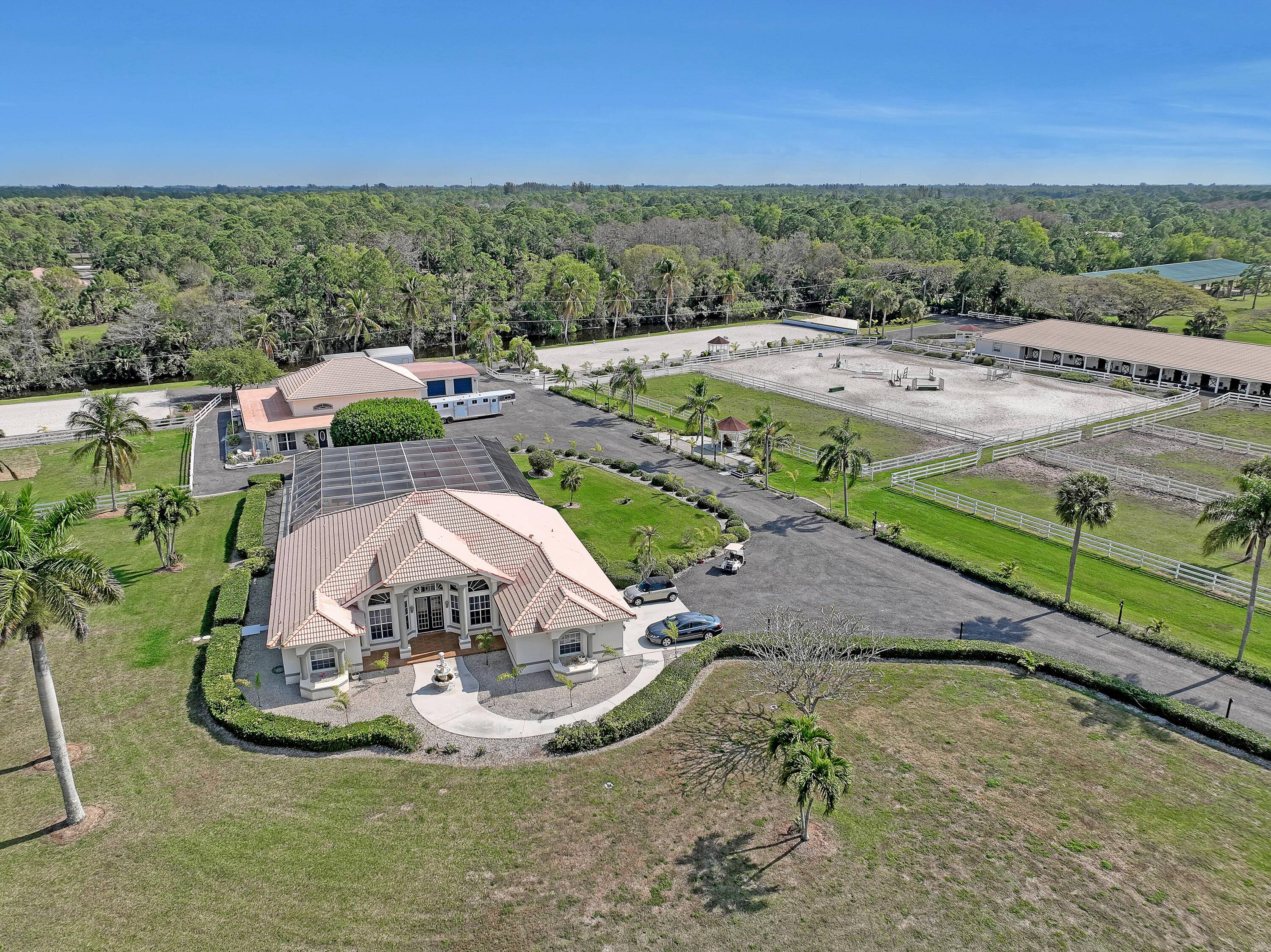 Beautiful Custom Equestrian property in sought after White Fences community.