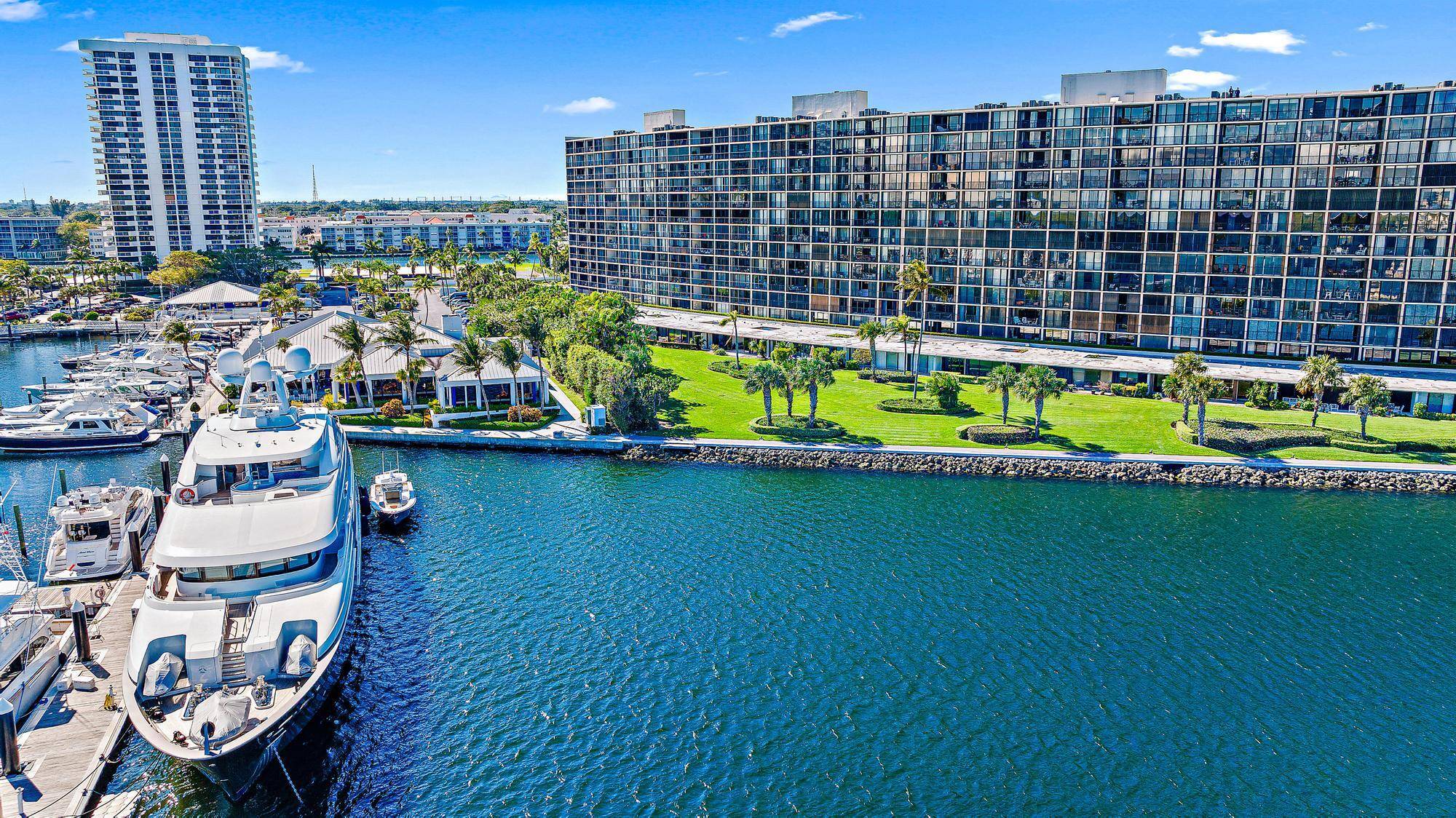 Step inside this completely renovated, waterfront residence w spectacular views of the Old Port Cove marina waterway.