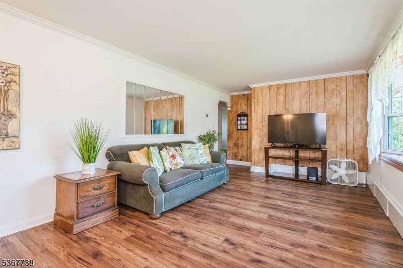 Located in a highly sought after neighborhood, this NORTH EAST facing freshly painted ranch offers the perfect blend of comfort, versatility and curb appeal.