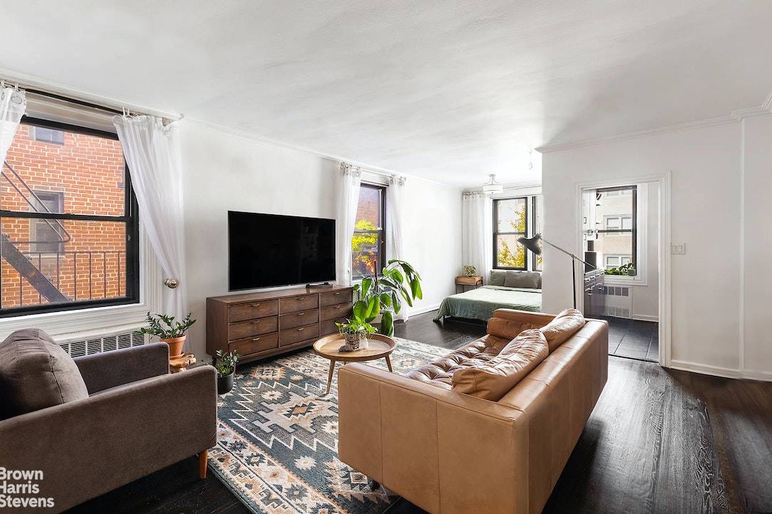 An Oversized Alcove Studio in the Heart of Greenwich Village Residence 5F is a bright and airy home that easily converts to a 1BR, or functions perfectly as is.