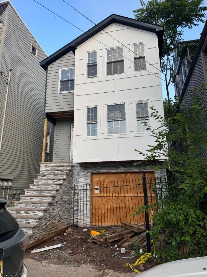Under Construction New Two Family Home in Newark's West SideModern and spacious, this new construction two family home features two full units across three levels ideal for owner occupants or ...