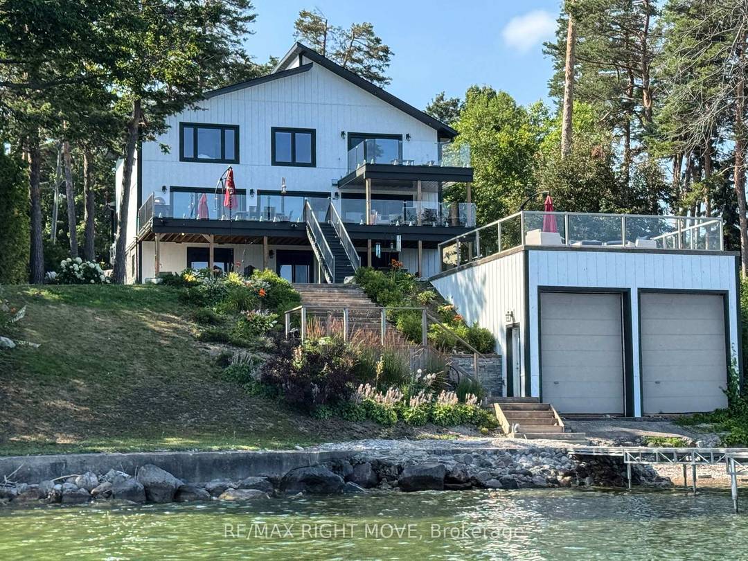 FOR THE SELECTIVE BUYER Over 100ft of south east Lake Simcoe waterfront amp ; 3890 sq ft of exceptional multi generational flexibility.
