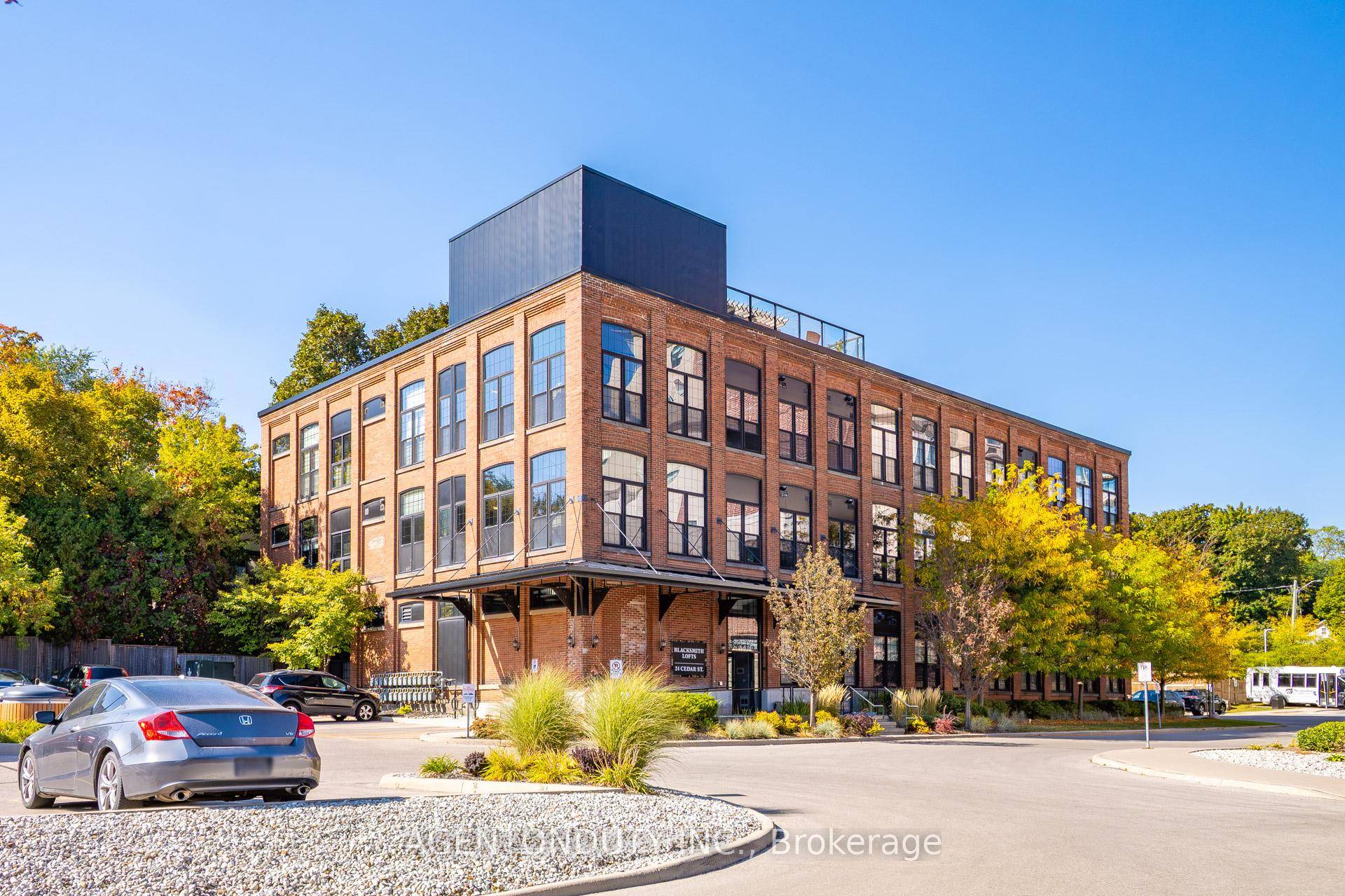 Rarely Available Ground Floor One Bedroom Authentic Loft with Red Brick and Exposed Beams and 13 Foot Ceilings.