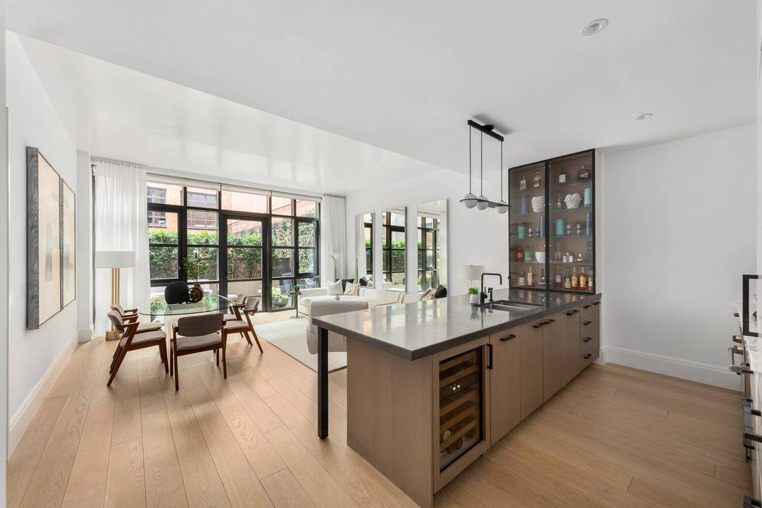 A one of one Garden level duplex in The Steiner, featured in Architectural Digest.