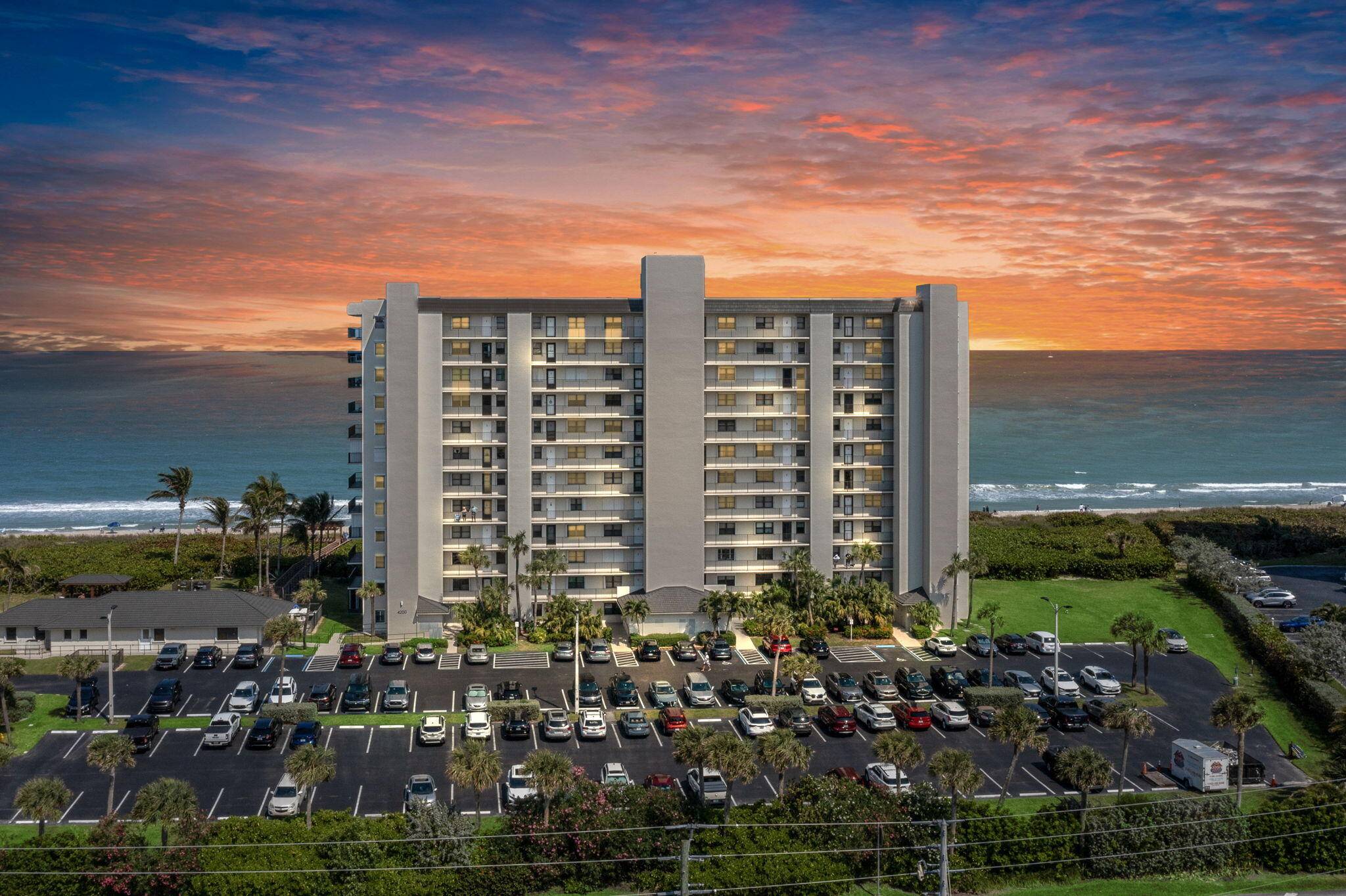 Experience coastal living at its finest in this quiet, south corner oceanfront condo with breathtaking panoramic views.