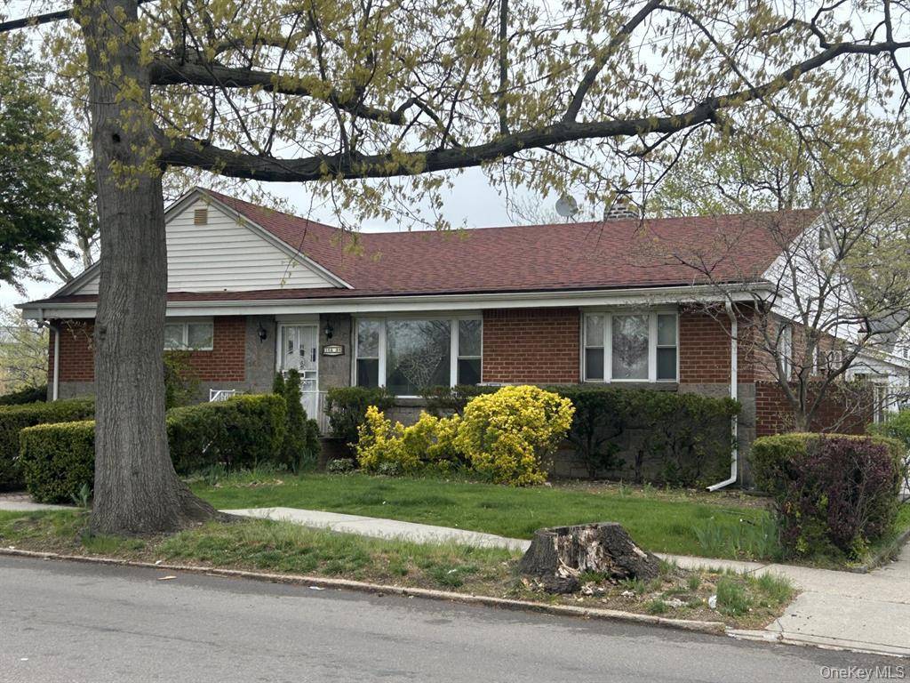 This charming brick detached ranch in Jamaica, Queens offers comfortable and convenient living with a well designed layout.