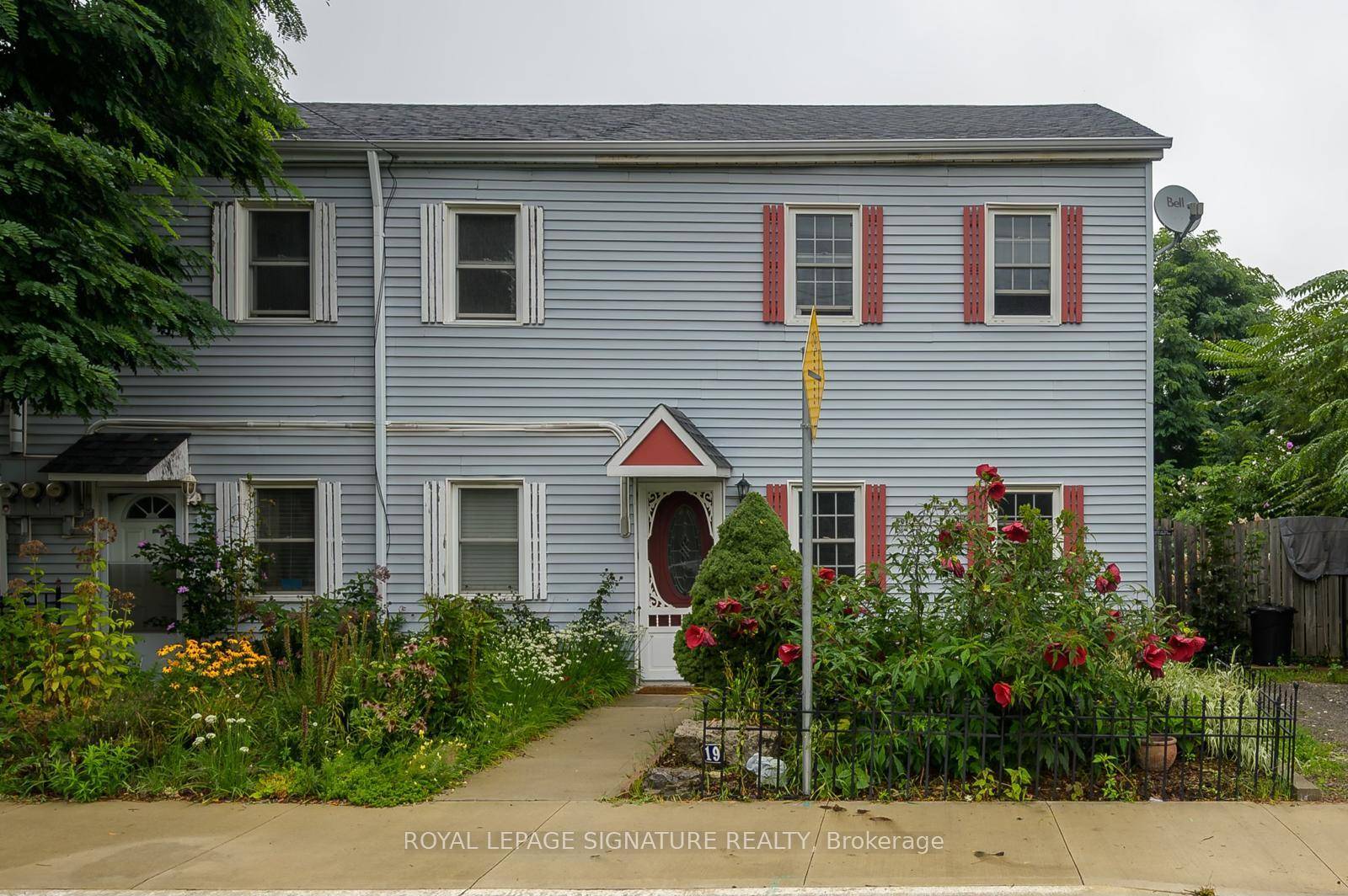 19 Strachan St E, where century old charm meets modern convenience in Hamilton's beloved North End.