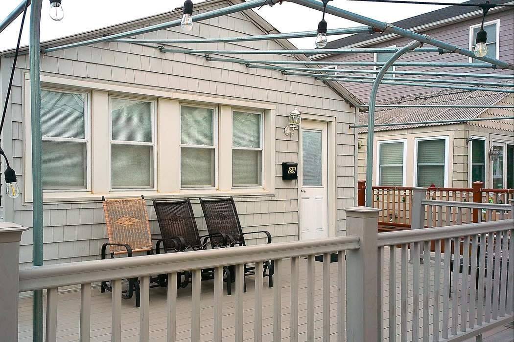 Move right into this stunning 2 bedroom, 1 bath beach bungalow, ideally situated on a desirable, easy access walk to the shore.