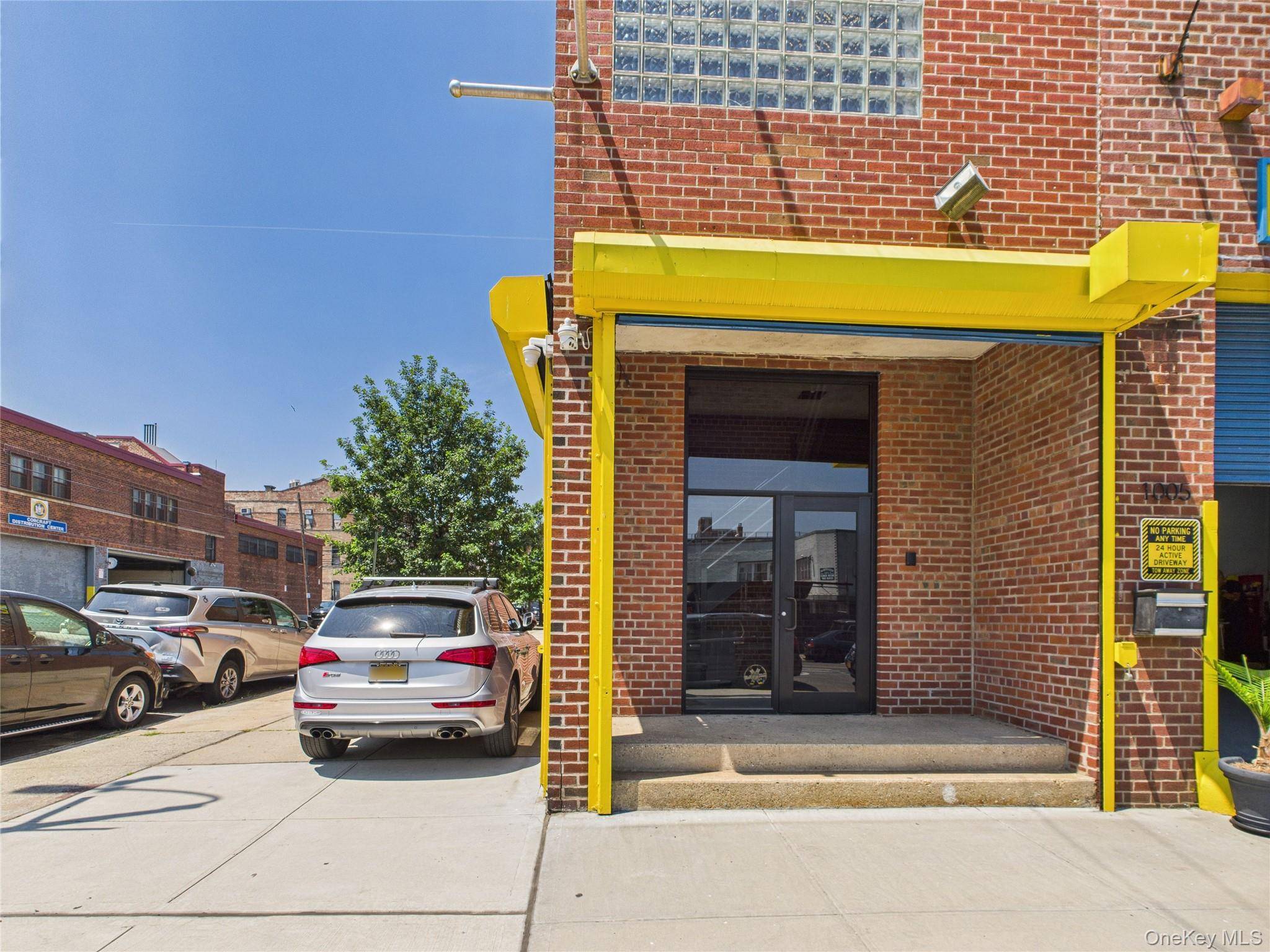 Commercial loft open floor plan with 3 private offices, 3 bathrooms, 1 has a shower.