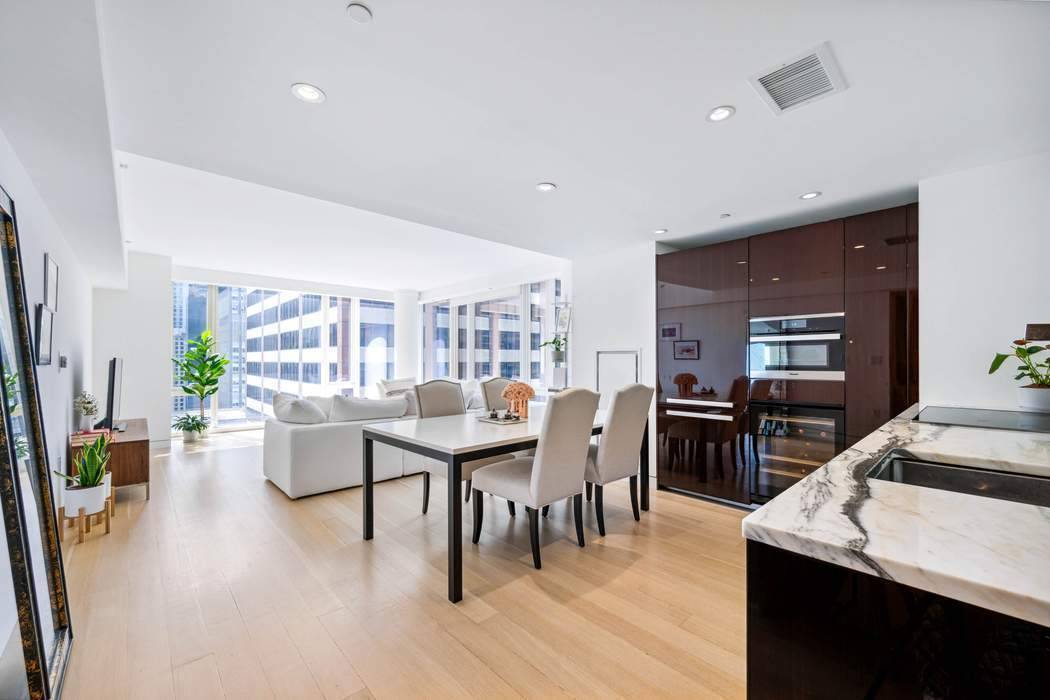 Stunning corner unit with brilliant natural light from Southern, Western, and Northern in a spacious 1540 square foot, 2 bedroom and 2.