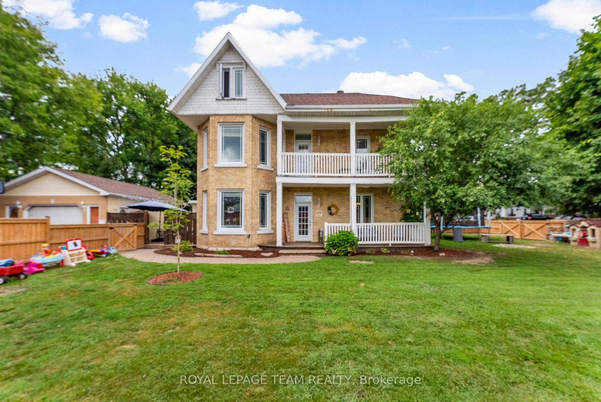 Welcome to this stunning 2 story century home that looks like it was plucked straight from the pages of a fairytale.