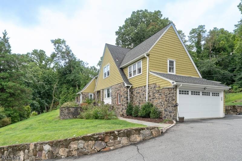 Stunning center hall Colonial majestically situated in one of South Orange's most sought after neighborhoods.