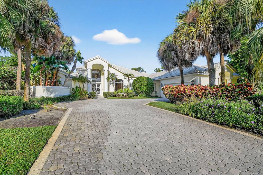 Welcome to an exceptional estate opportunity in the prestigious Breakers West perfectly positioned on a private 1.