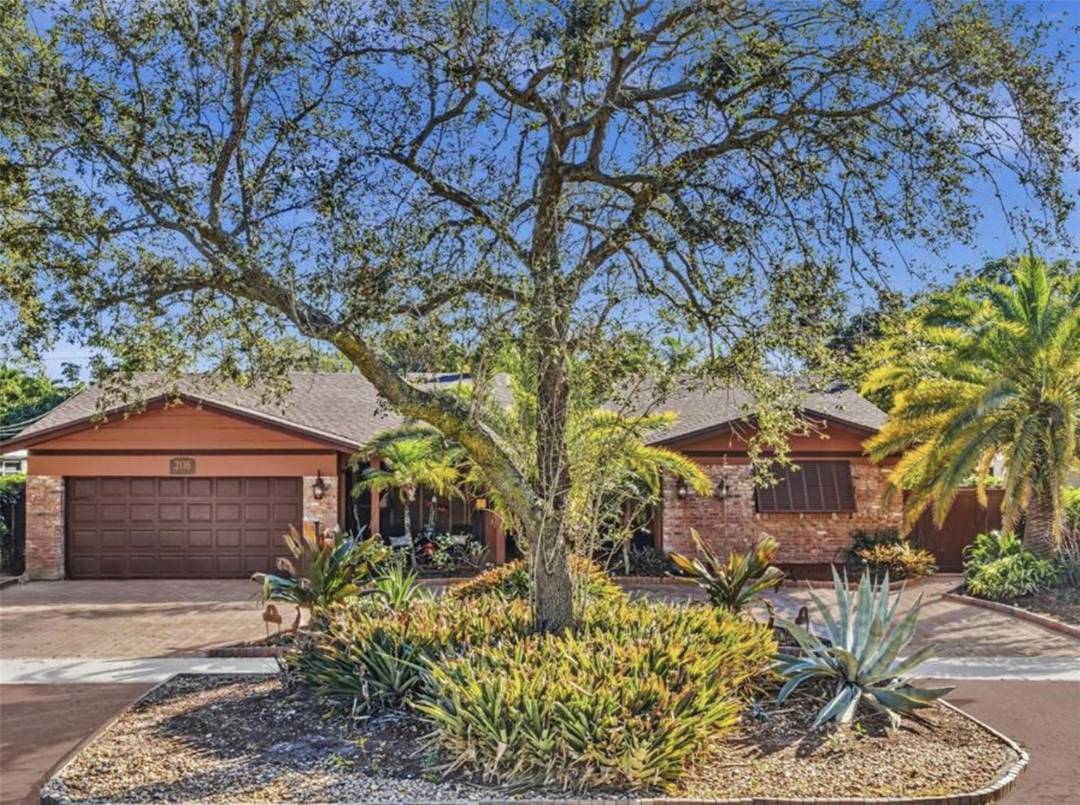 Spacious Imperial Point pool home offering four plus bedrooms, wide frontage, and flexible living spaces in a prime Fort Lauderdale neighborhood.