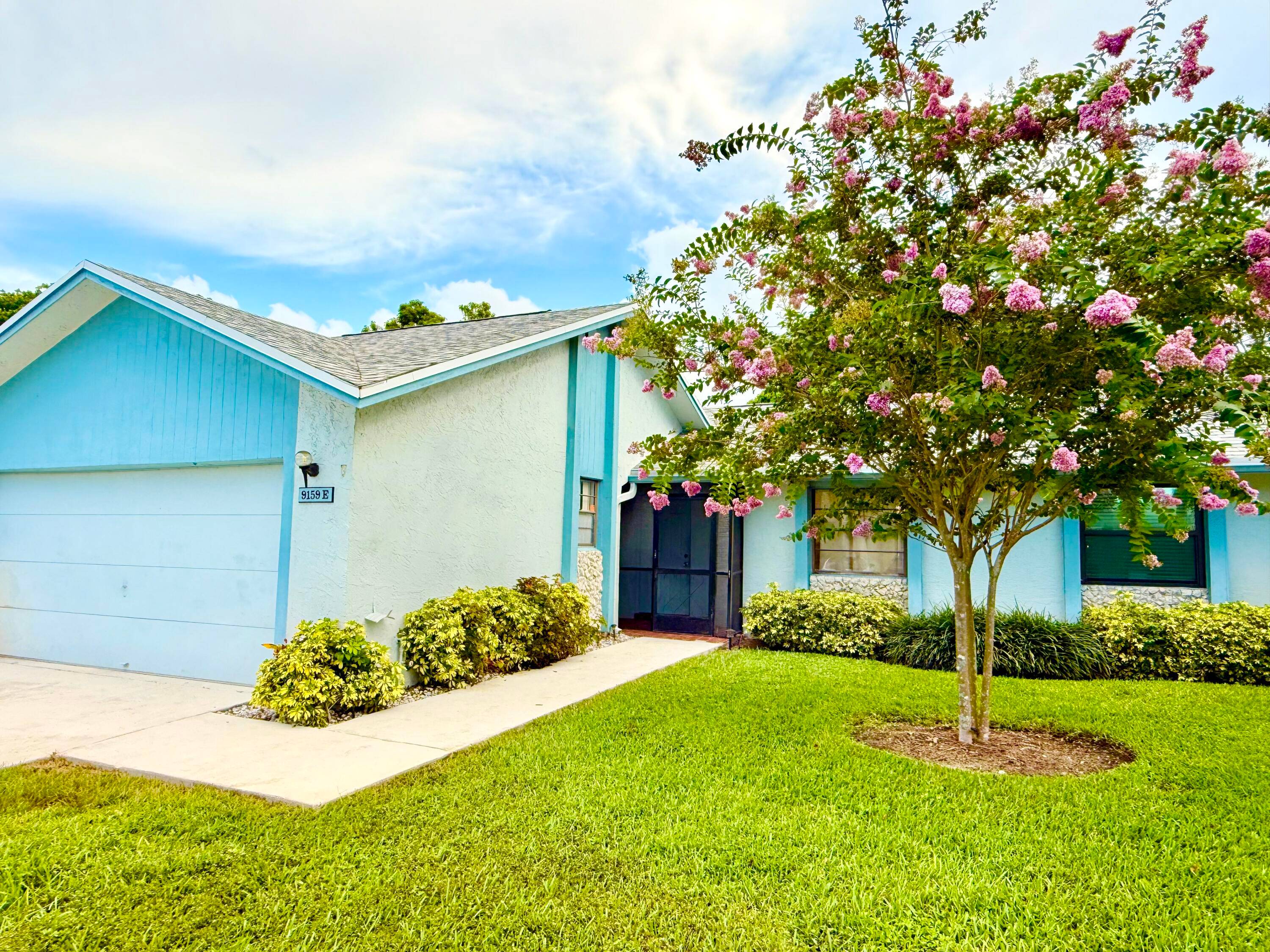 Discover the potential in this spacious 4 bedroom, 2 bathroom home w a large 2 car garage in Boca Raton.