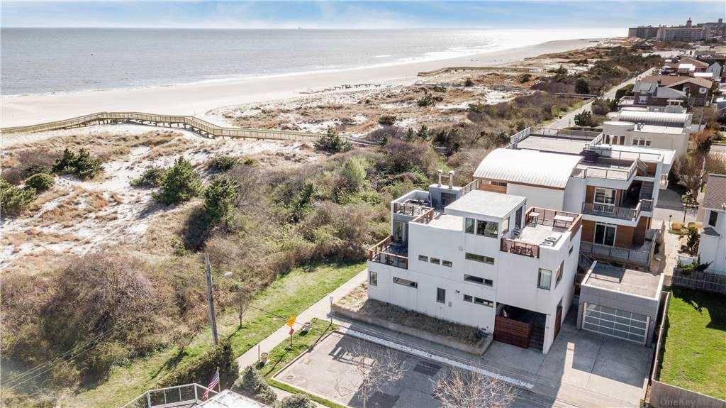 Lido Dunes Direct Oceanfront Stunning Mint Condition Home Featuring 5 Bedrooms, 3 Bathrooms, Spectacular Roof Top Deck With Fireplace And Unobstructed Ocean View, Gourmet Eat in Kitchen, Open Layout Living ...