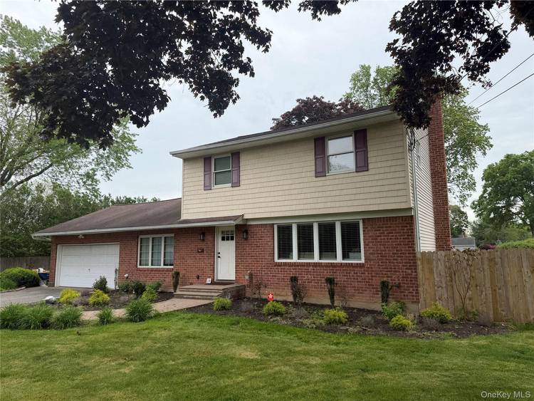 Beautifully renovated three bedroom colonial with open floor plan.