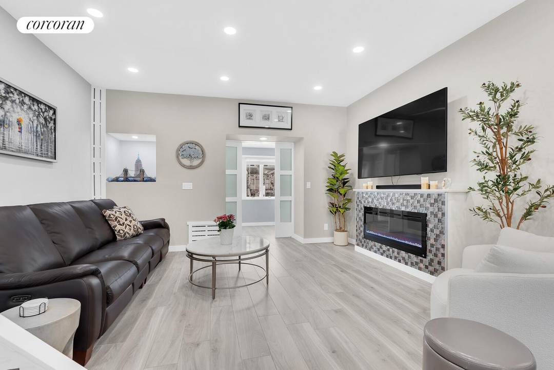 Welcome to 743 E 9th St, a charming single family residence that seamlessly blends modern convenience with timeless elegance.