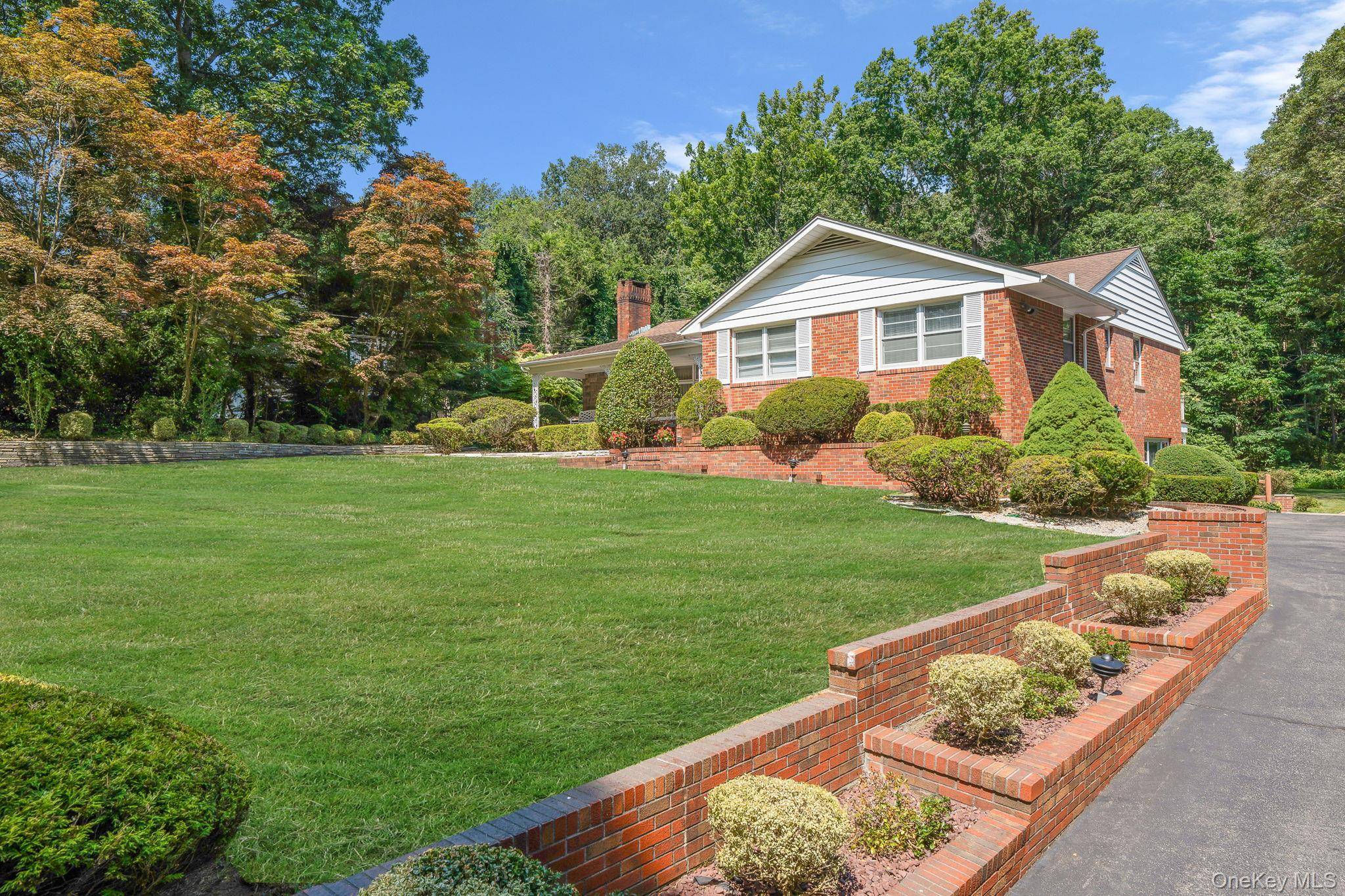 A Rare Offering in the Half Hollow School District Classic Brick Ranch on 1.