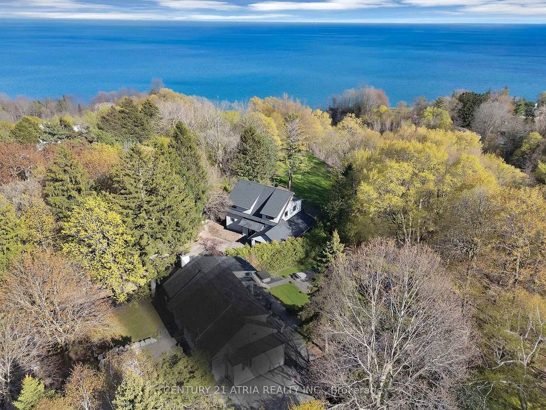 Experience the privacy, tranquility, and breathtaking views you've been dreaming of, Nestled on an impressive lot, this one of a kind estate offers stunning panoramic lake views and a setting ...