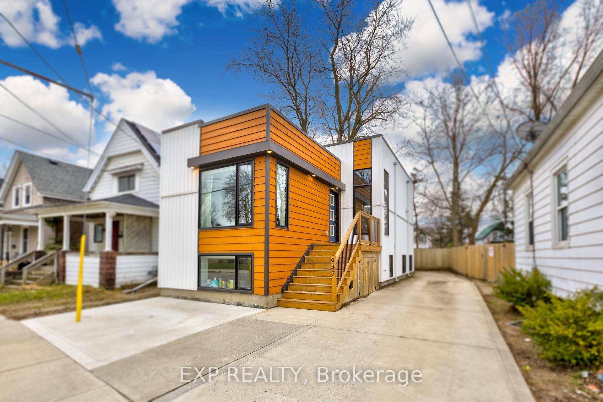 This stunning, uniquely designed modern home sits in the heart of London, offering a prime location near shopping, downtown, and the vibrant Old East Village.