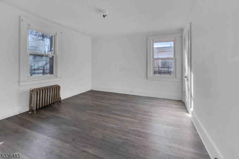 Brick City Special ! Spacious versatile one family home with endless possibilities.