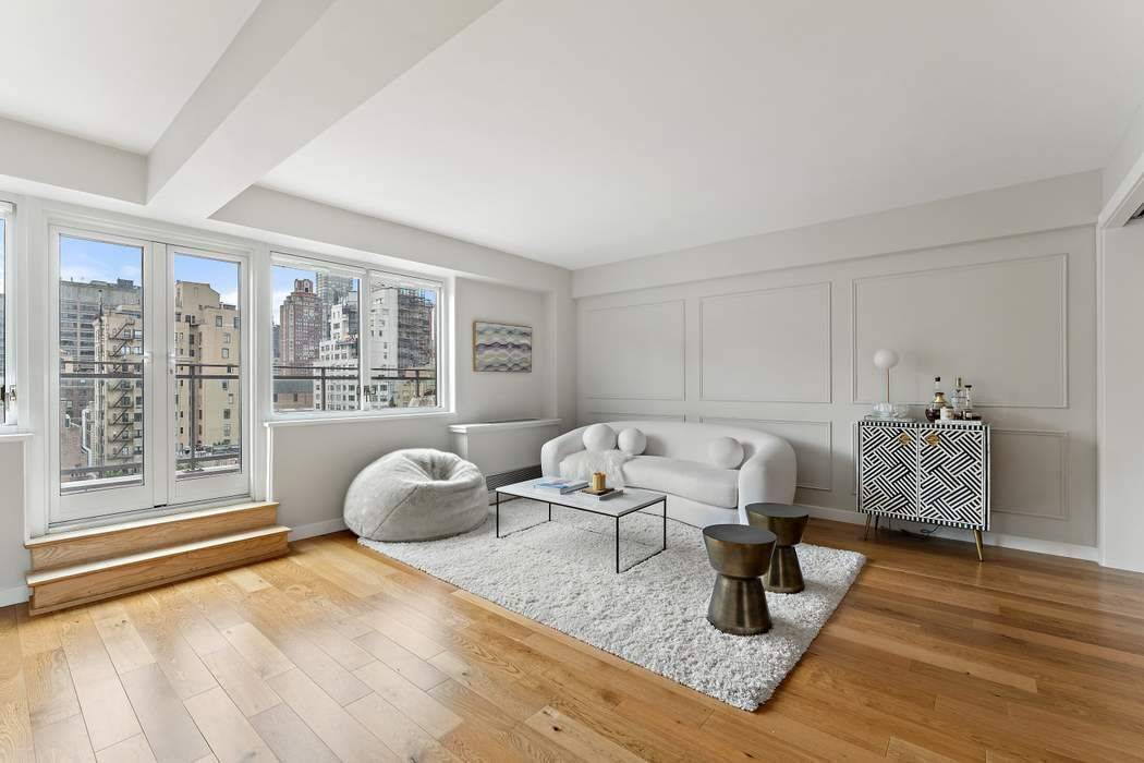 Welcome to this exquisite and light filled two bedroom, two bathroom residence, ideally located on the corner of Madison Avenue and 68th Street.