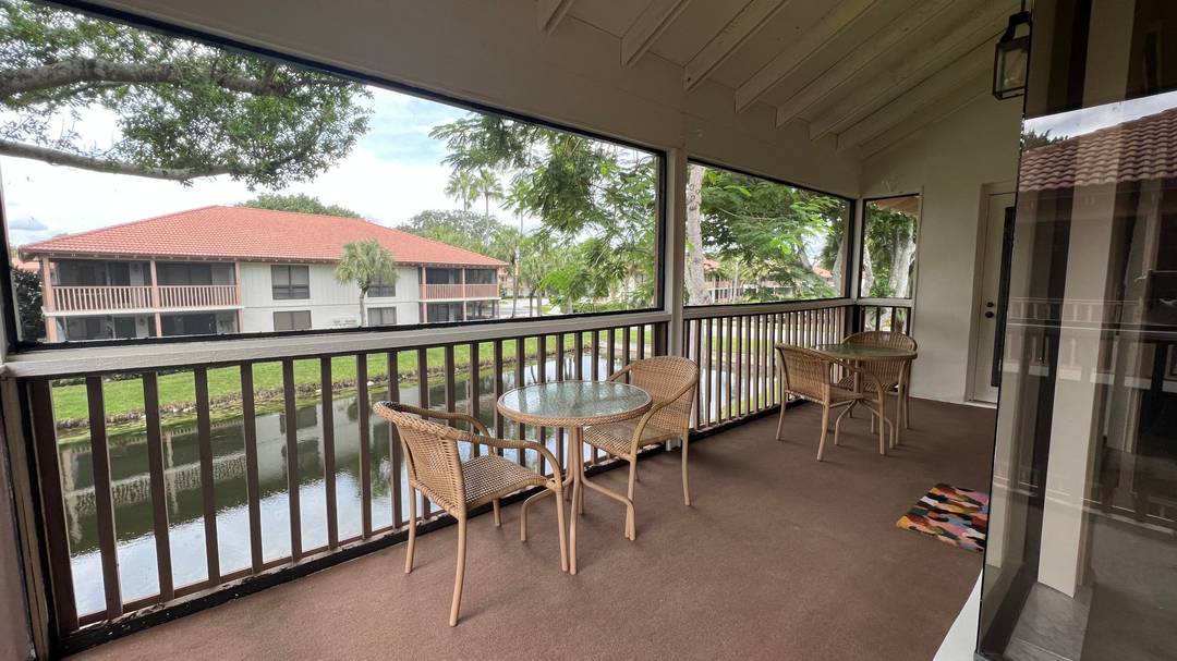 Beautiful end unit large condo with extreme windows and wraparound patio, nice water views.