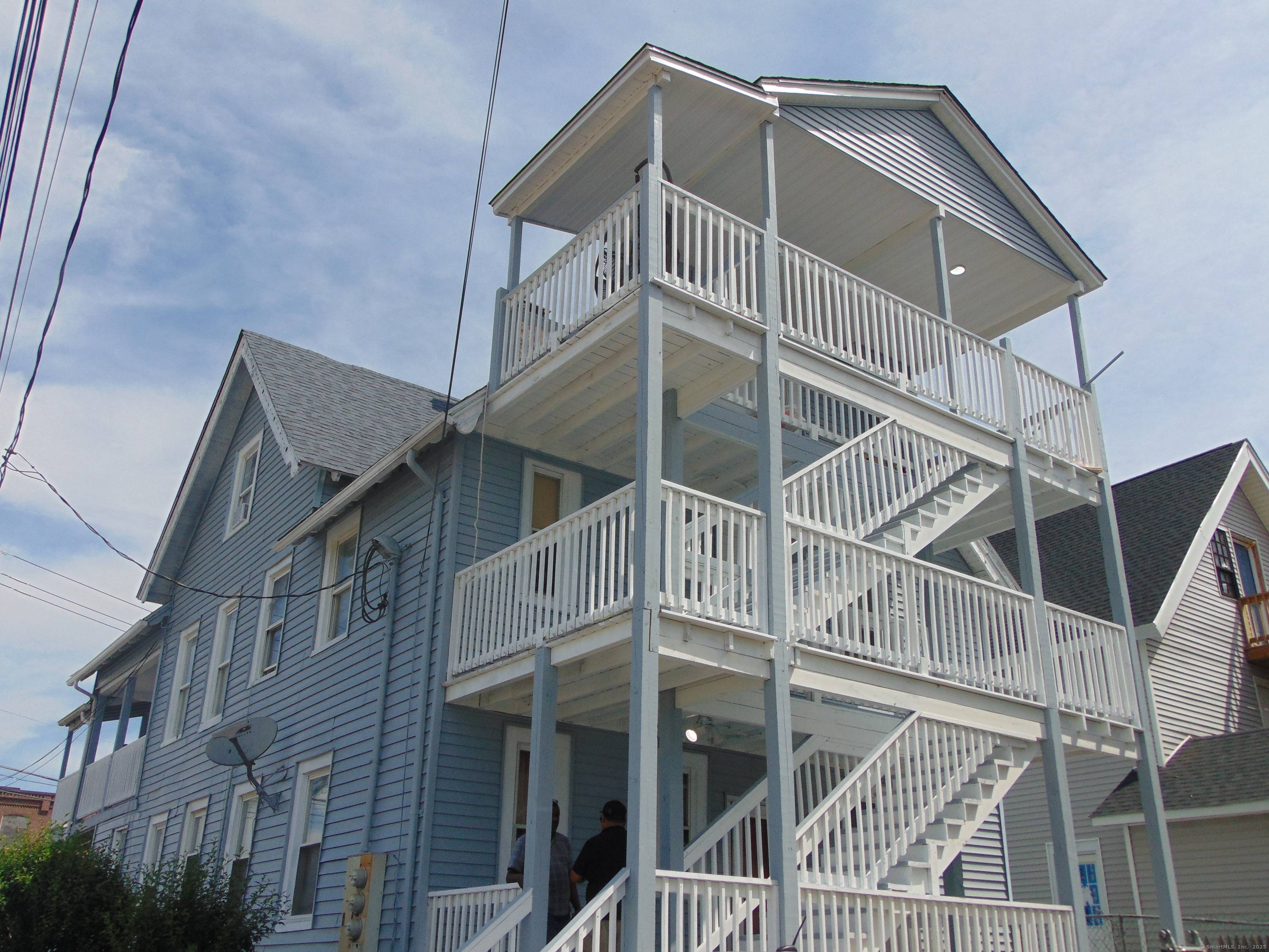 3 Family with all New Pressure treated Front and Rear Outside Staircases Decks to all 3 Floors, 3 3 2 Bedrooms, All Floors Rented but on a Month to Month ...