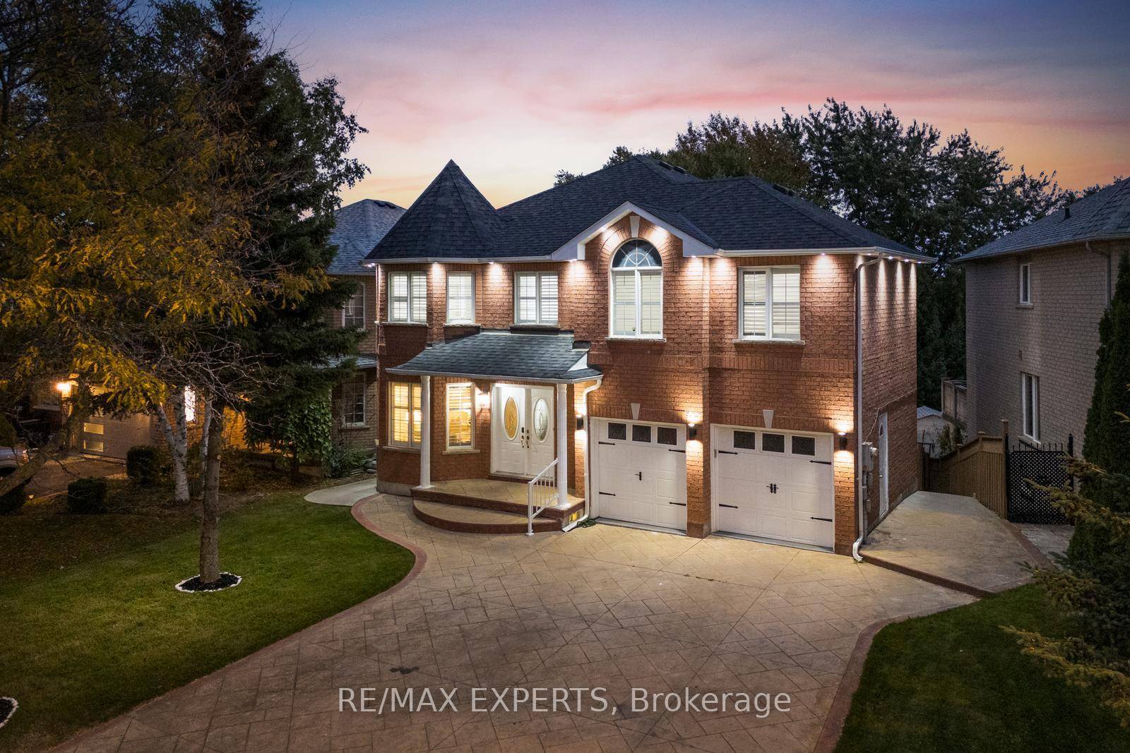 Welcome to 147 Ashton Dr, a beautifully renovated 4 3 bedroom, 5 bath detached home featuring 3 kitchens, 2 laundry rooms, and approximately 4, 000 sq.