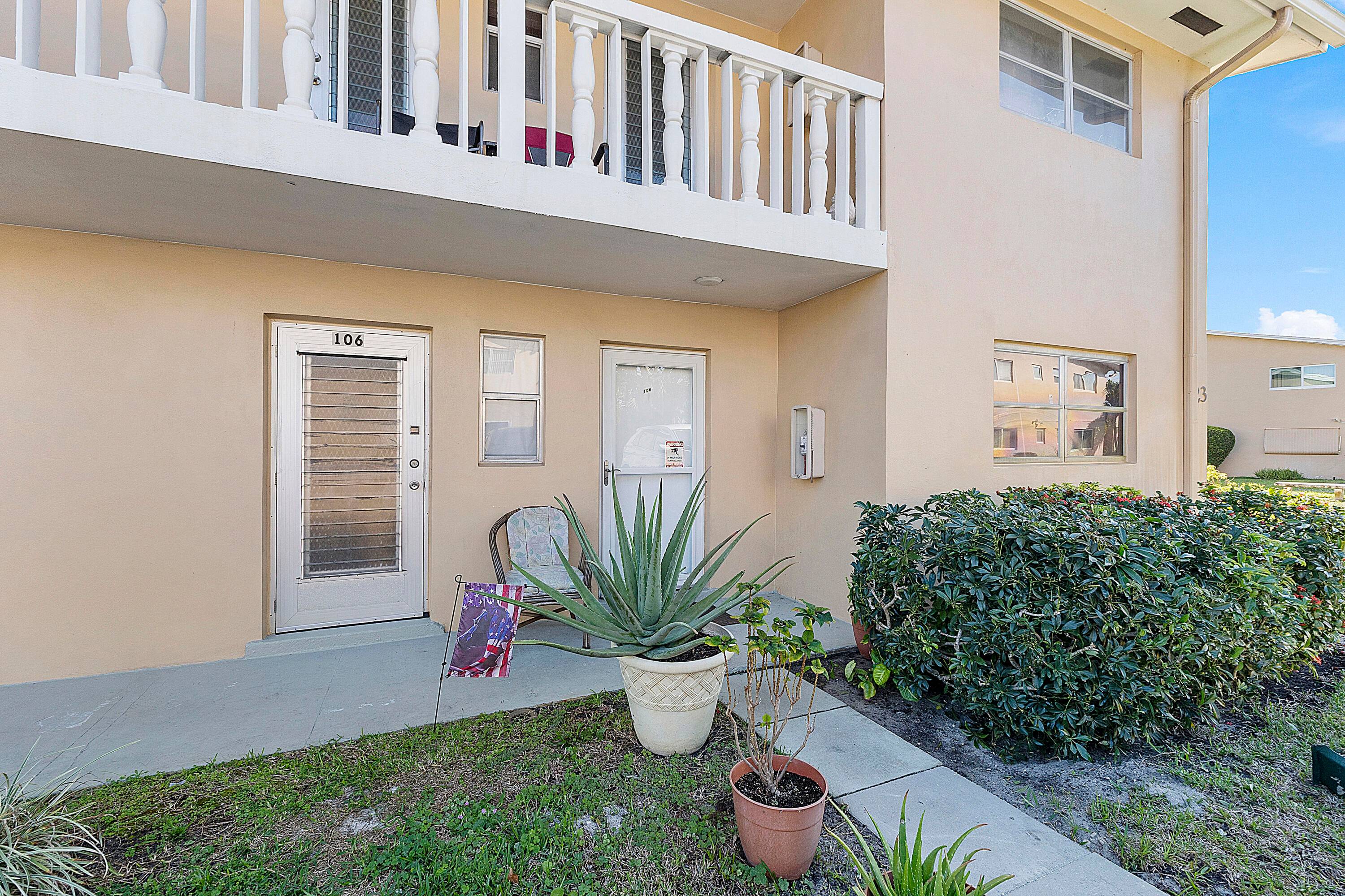 This beautiful GROUND FLOOR corner unit features an updated kitchen with granite countertops, tile flooring throughout.