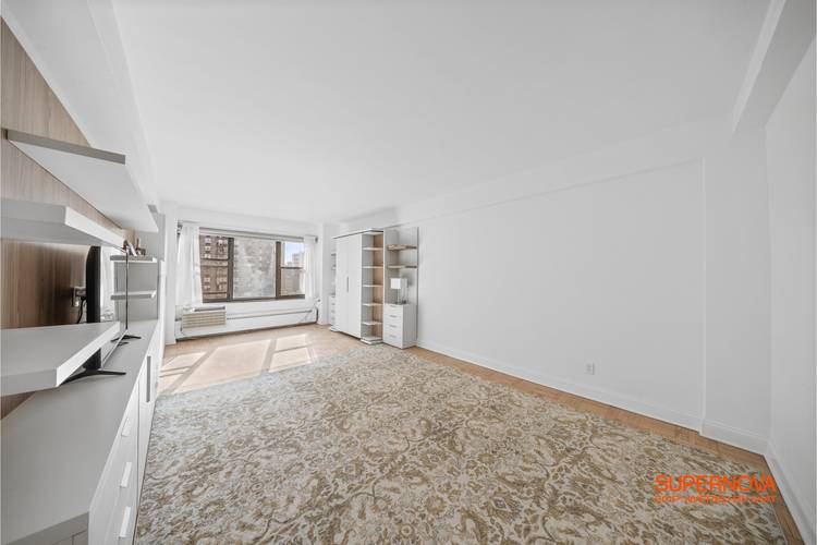 Welcome to 2 Tudor City Place, Residence 10LS, a serene Midtown sanctuary in one of New York s most historic and charming enclaves.